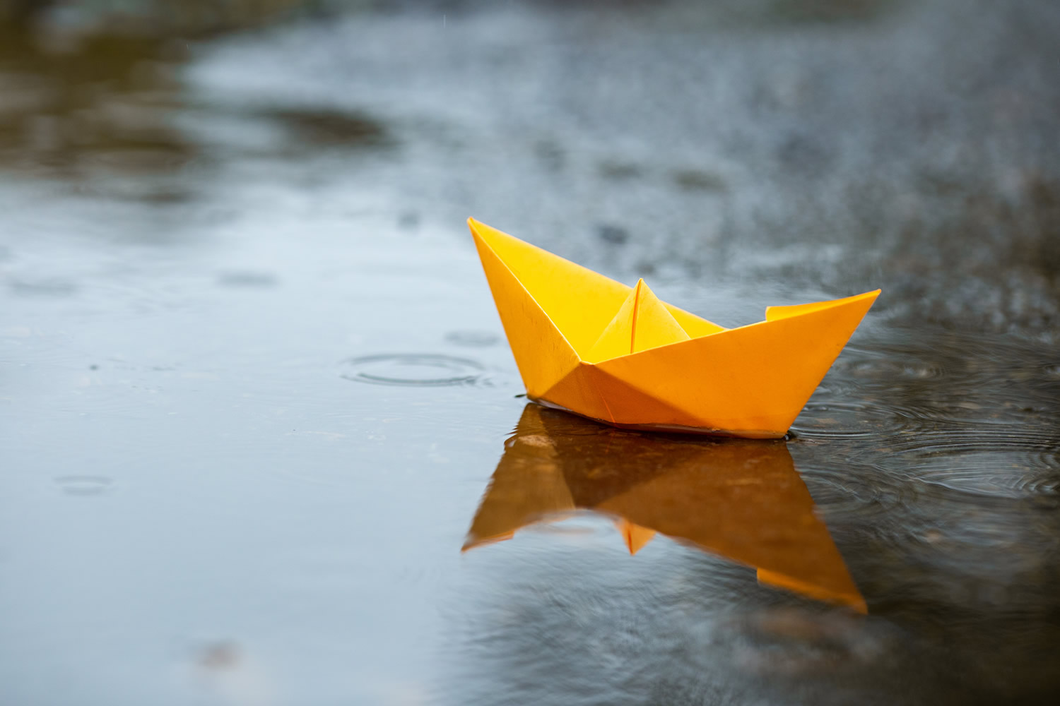 paper handmade yellow boat toy pouddle rain